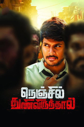 Poster for “Nenjil Thunivirunthal”